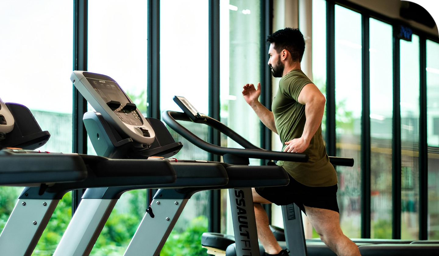Man running on treadmill.